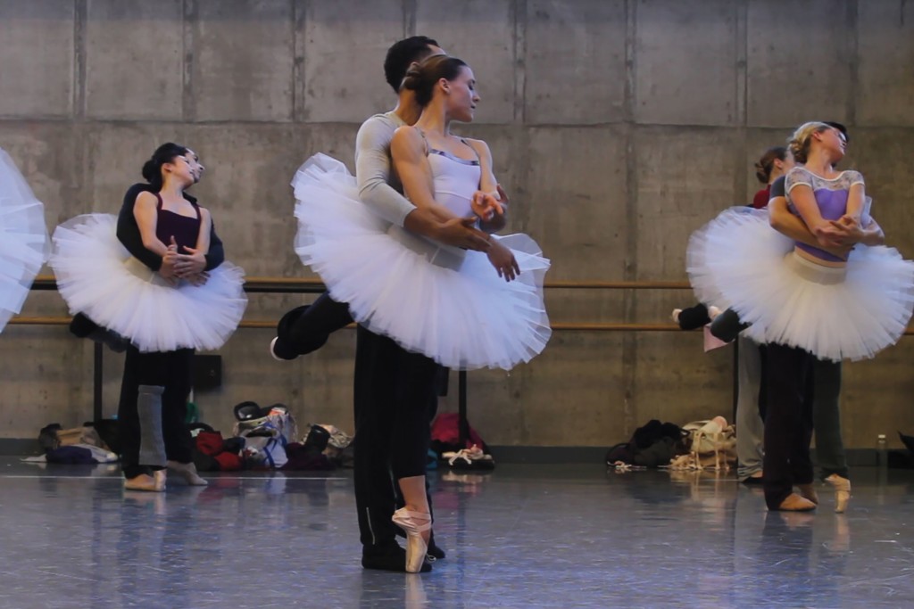 Tempe Ostergren and Lamin Pereira dos Santos rehearse 'Swan Lake,' flanked by other couples / Photo courtesy Kansas City Ballet