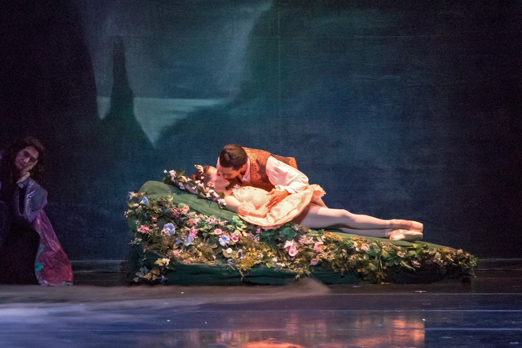 Like it or not, Prince Désiré must plant a kiss on the slumbering Aurora's lips to break the evil Carabosse's spell