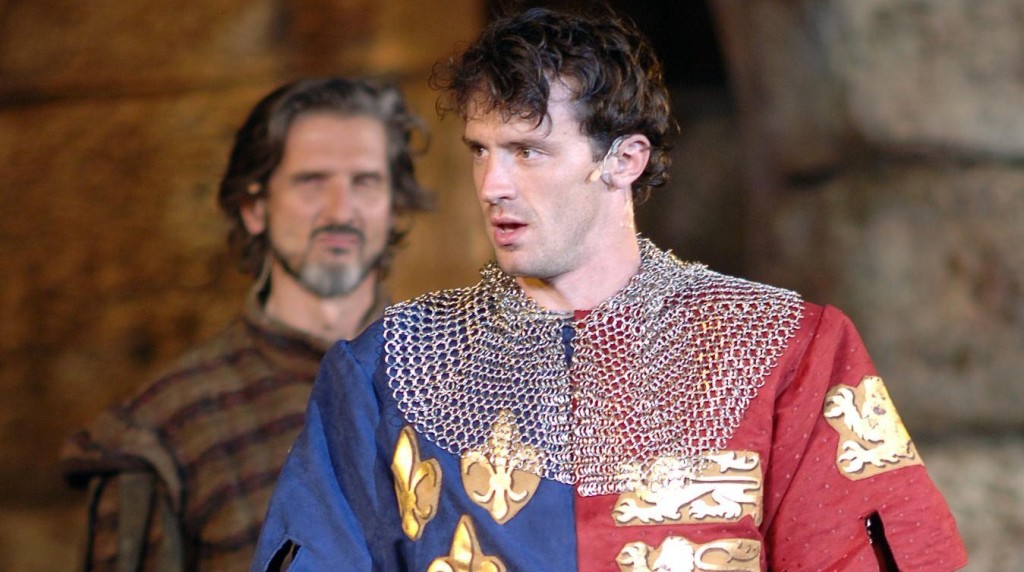 Nathan Darrow , shown here with a menacing Bruce Roach, played the title role in HASF's 'Henry V' / Courtesy of Heart of America Shakespeare Festival